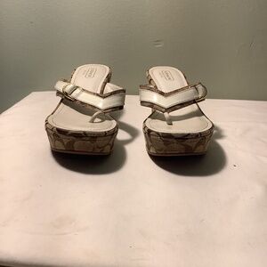 Woman’s Coach wedge flip flops